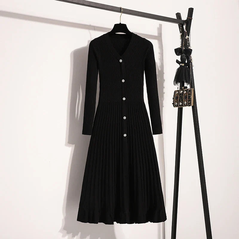 Robe mi-longue imprimée avec boutons bijoux