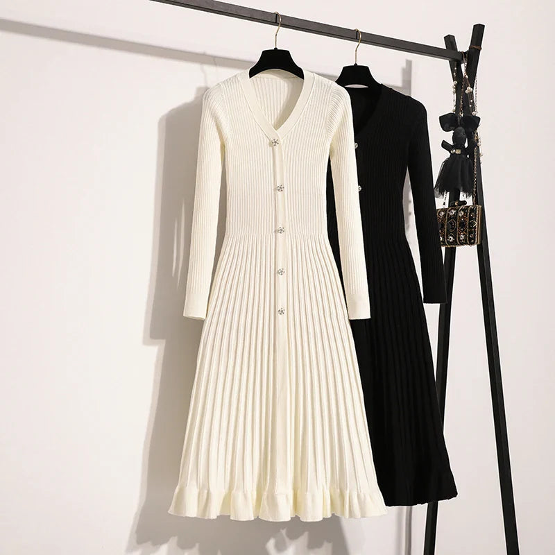 Robe mi-longue imprimée avec boutons bijoux